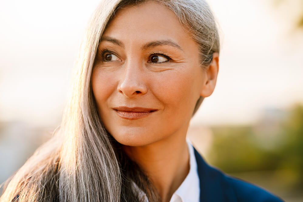 mature-asian-businesswoman-wearing-suit-smiling-an-2025-02-15-12-27-42-utc (1)