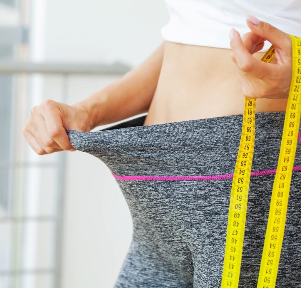 woman-in-oversize-pants-after-weight-loss-diet-co-2023-11-27-04-58-10-utc (1)